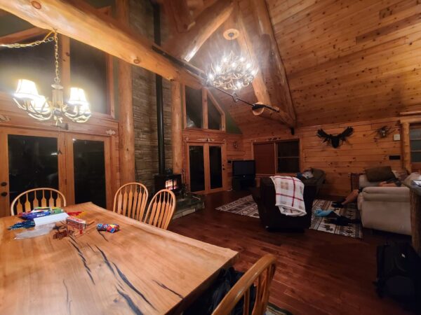 sycamore slab table in cabin in new york