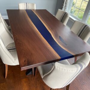 6 foot black walnut with dark blue epoxy river table
