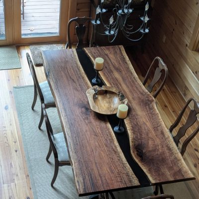 90" x 45"-47" live edge figured black walnut with black epoxy river table