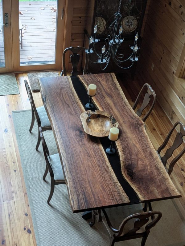 90" x 45"-47" live edge figured black walnut with black epoxy river table