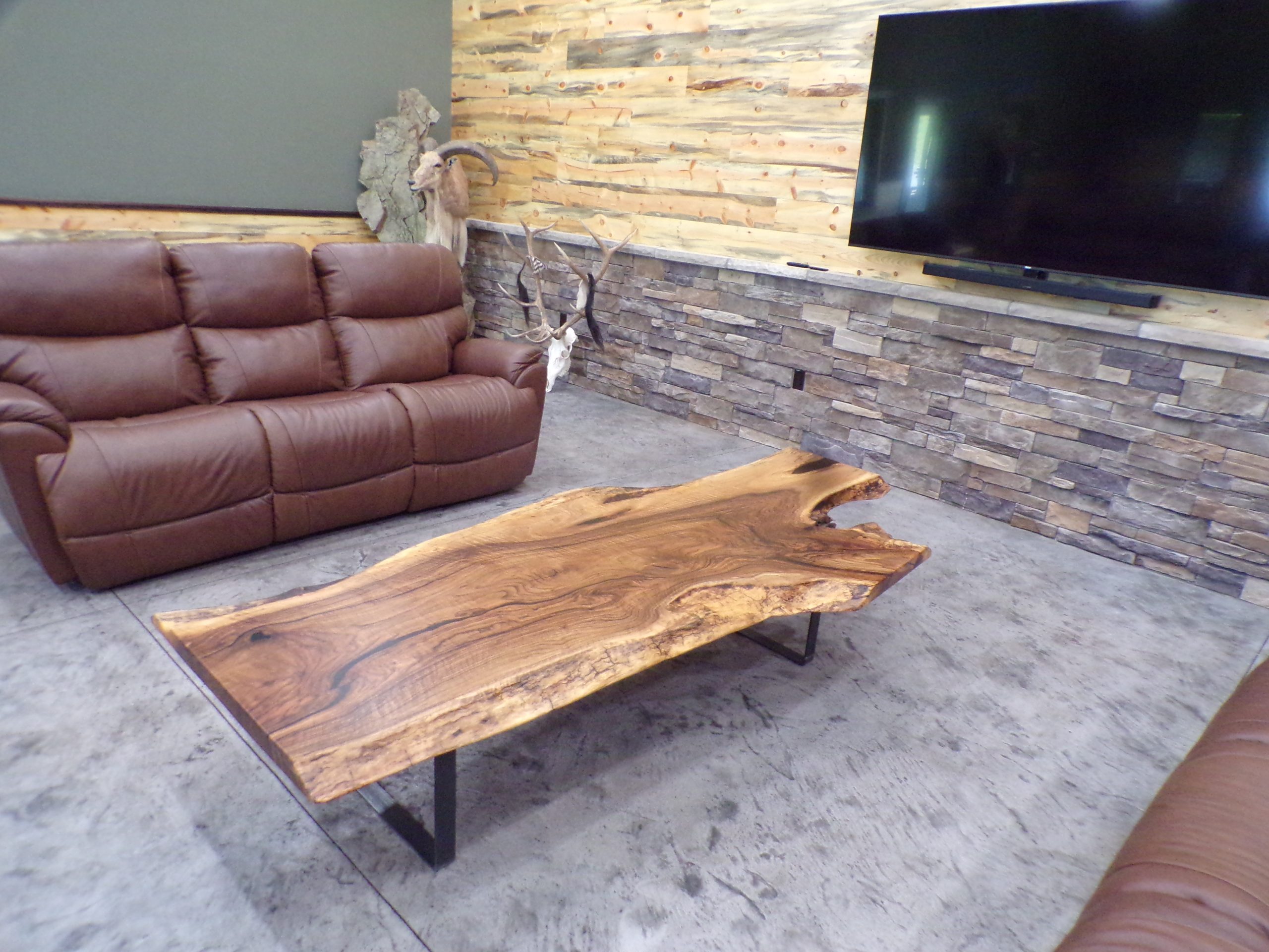 7′ live edge coffee table made with an English walnut slab