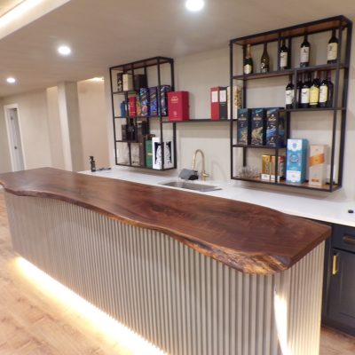 Bartop: 12' x 24-30" live edge black walnut bar top