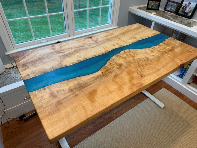 36" x 64" maple with turquoise blue epoxy river desktop.